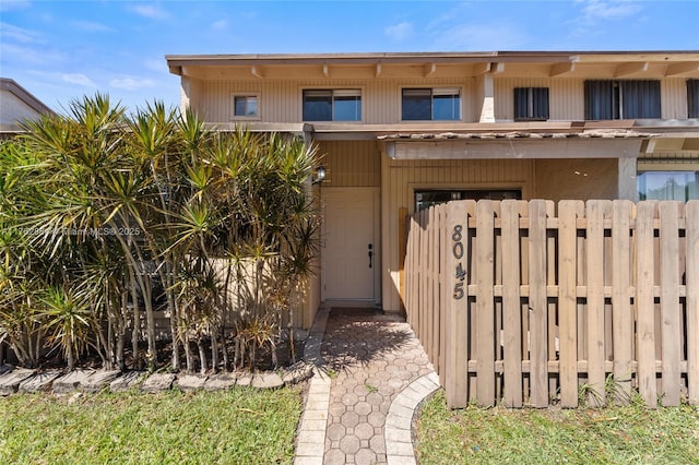 view of front of property with fence