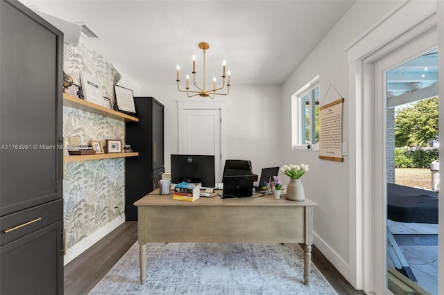 office with dark wood finished floors, an inviting chandelier, visible vents, and baseboards