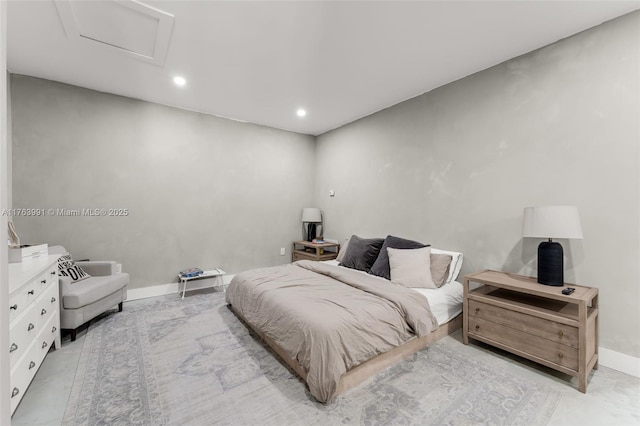 bedroom with recessed lighting, attic access, and baseboards