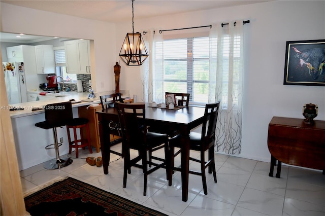 dining room with an inviting chandelier