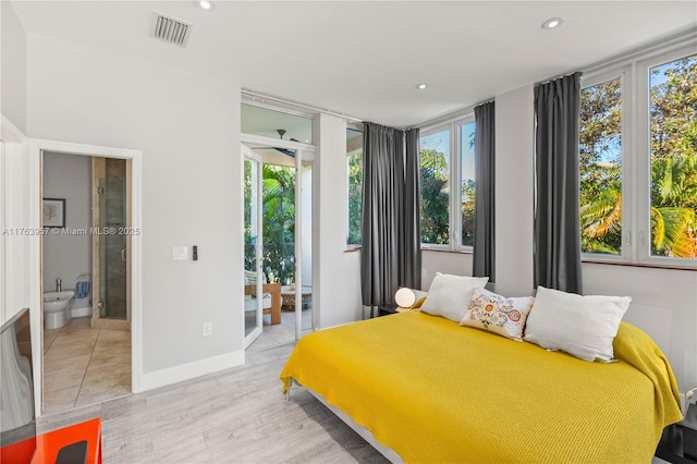 bedroom with visible vents, light wood finished floors, baseboards, recessed lighting, and access to outside