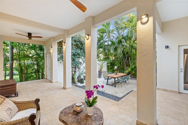 view of patio / terrace with outdoor dining area and ceiling fan