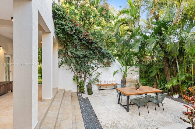 view of patio with outdoor dining area