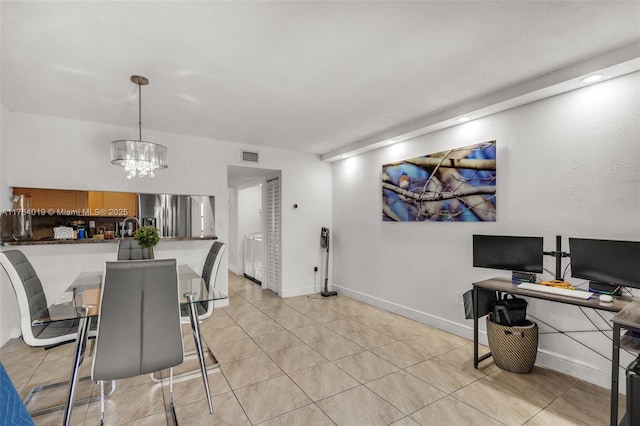 dining area with visible vents, baseboards, an inviting chandelier, and light tile patterned flooring