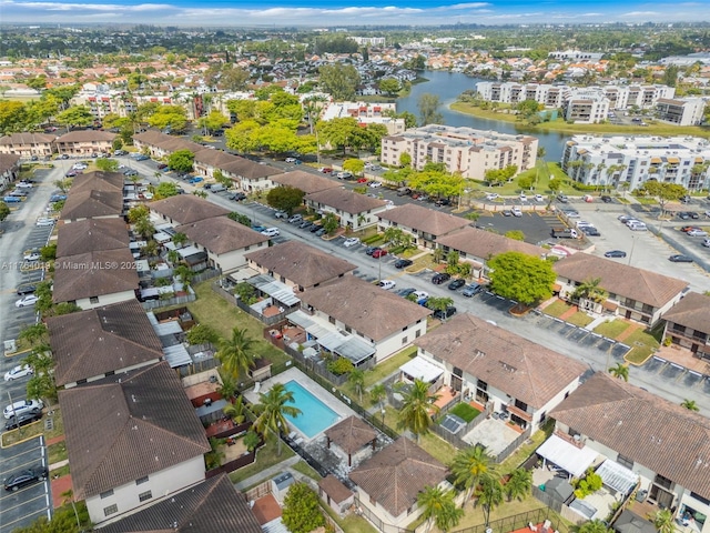 aerial view featuring a residential view and a water view