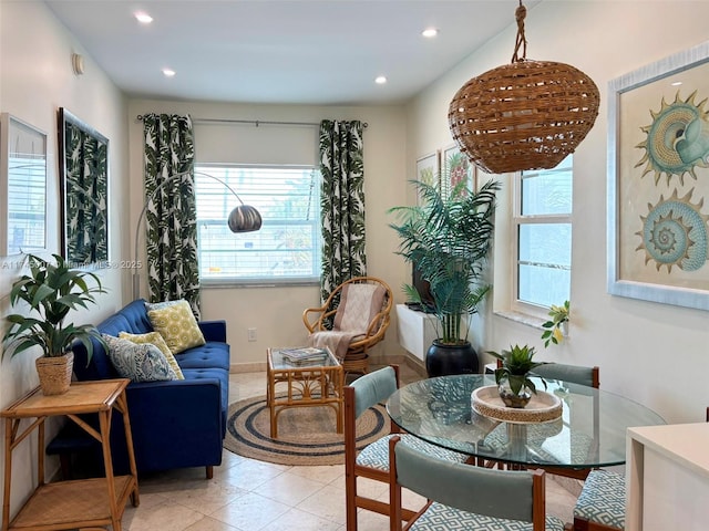 living area with recessed lighting, baseboards, and light tile patterned floors