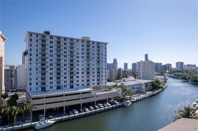 exterior space featuring a water view and a view of city