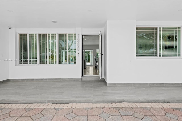 doorway to property with stucco siding