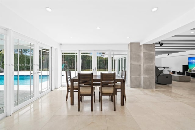 dining room with plenty of natural light, french doors, and recessed lighting