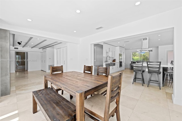 dining space featuring recessed lighting and visible vents