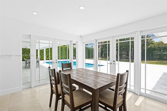 dining area with recessed lighting, french doors, and baseboards