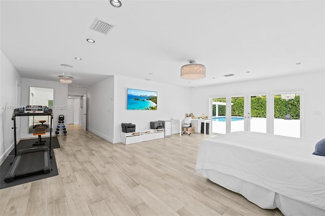 bedroom with access to exterior, visible vents, light wood-type flooring, recessed lighting, and french doors