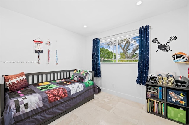 bedroom with recessed lighting and baseboards