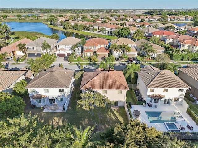 aerial view with a residential view and a water view