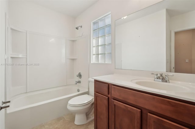 bathroom with tub / shower combination, toilet, vanity, and tile patterned flooring