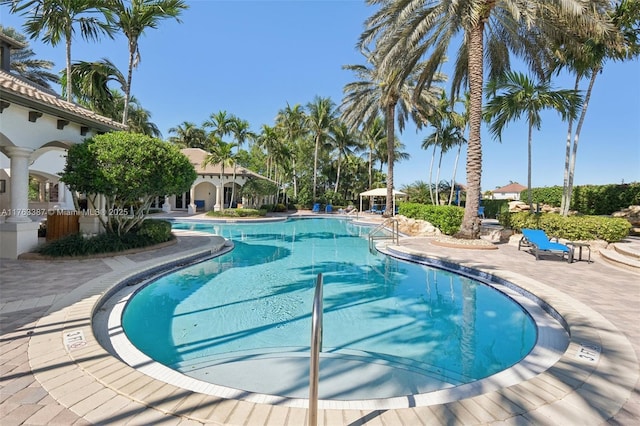 community pool with a patio