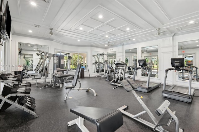 exercise room featuring plenty of natural light, recessed lighting, visible vents, and coffered ceiling