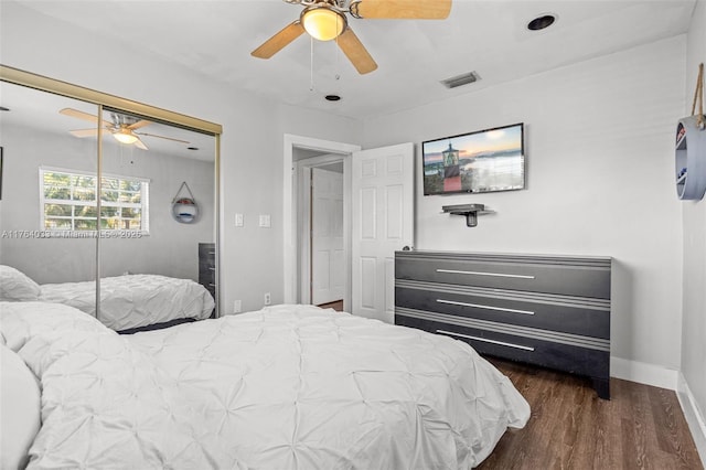 bedroom with visible vents, ceiling fan, baseboards, and dark wood-style flooring