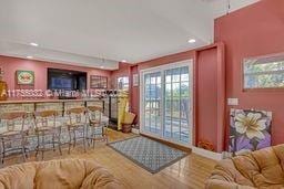 interior space featuring recessed lighting and wood finished floors