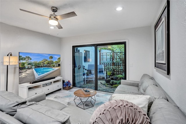 living room featuring recessed lighting and ceiling fan