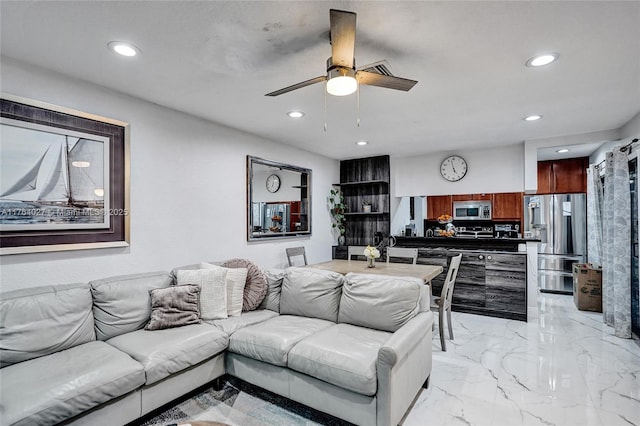 living room with recessed lighting, marble finish floor, and ceiling fan