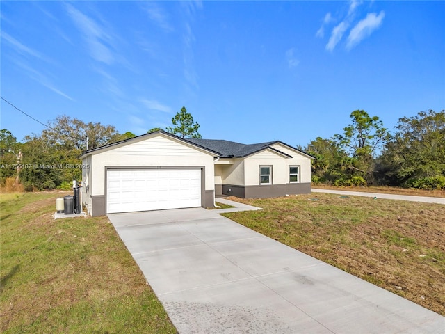 ranch-style house with stucco siding, driveway, a front yard, and an attached garage