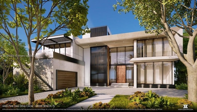 view of front facade featuring stucco siding and a balcony