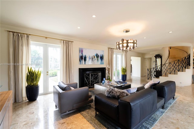 living area featuring a fireplace, recessed lighting, ornamental molding, stairs, and a notable chandelier