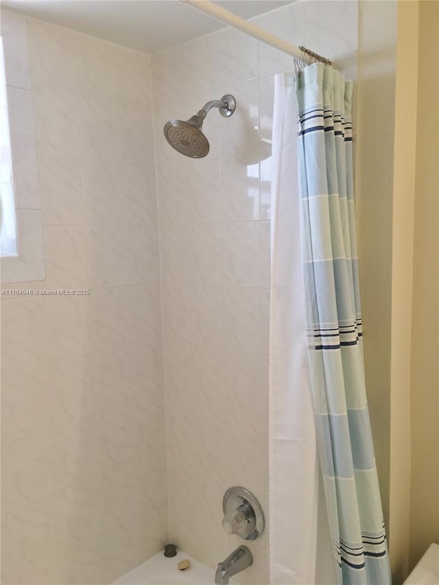 full bathroom featuring shower / bath combo