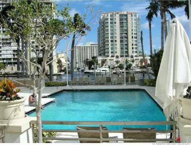 community pool with a city view