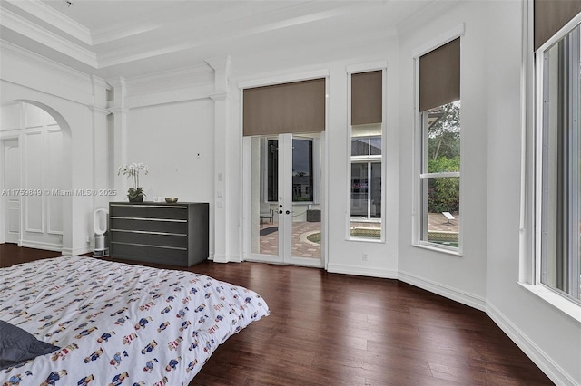 bedroom with access to exterior, crown molding, baseboards, dark wood finished floors, and french doors