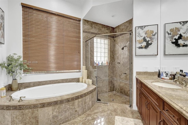 bathroom featuring vanity, a bath, and a shower stall