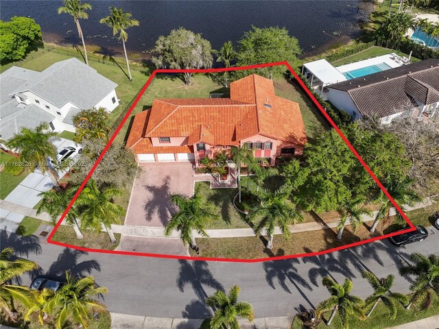 221 NW 201st Ave, Pembroke Pines, FL 33029 - view of subject property featuring property parcel outlined, a large body of water, and a pool area