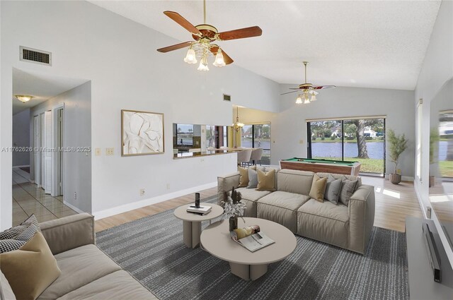 221 NW 201st Ave, Pembroke Pines, FL 33029 - living room with a ceiling fan, high vaulted ceiling, billiards, wood finished floors, and baseboards