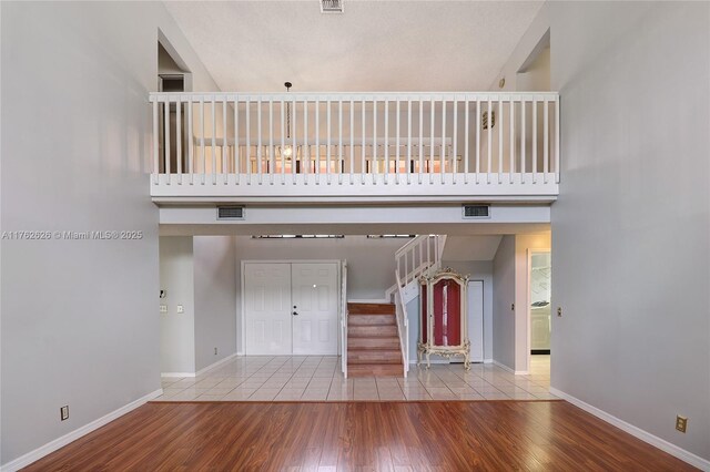 221 NW 201st Ave, Pembroke Pines, FL 33029 - foyer with stairs, baseboards, and wood finished floors