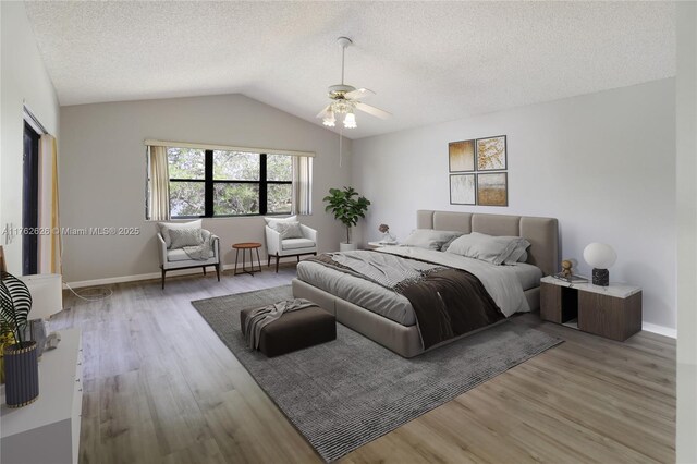 221 NW 201st Ave, Pembroke Pines, FL 33029 - bedroom featuring wood finished floors, lofted ceiling, a textured ceiling, baseboards, and ceiling fan