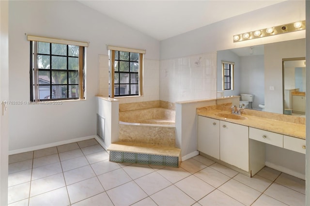 221 NW 201st Ave, Pembroke Pines, FL 33029 - full bathroom with lofted ceiling, a bath, vanity, tile patterned flooring, and baseboards