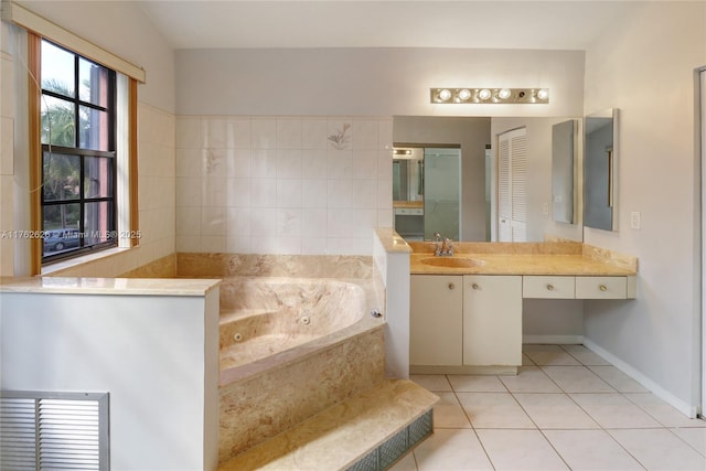 221 NW 201st Ave, Pembroke Pines, FL 33029 - full bathroom featuring tile patterned flooring, a tub with jets, vanity, and baseboards