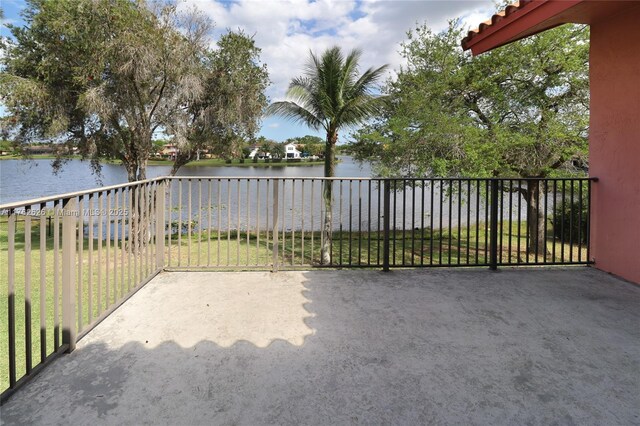 221 NW 201st Ave, Pembroke Pines, FL 33029 - view of patio / terrace with a water view