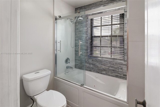 221 NW 201st Ave, Pembroke Pines, FL 33029 - bathroom with toilet and bath / shower combo with glass door