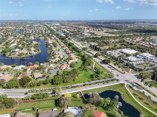 221 NW 201st Ave, Pembroke Pines, FL 33029 - aerial view of property and surrounding area featuring a large body of water and nearby suburban area