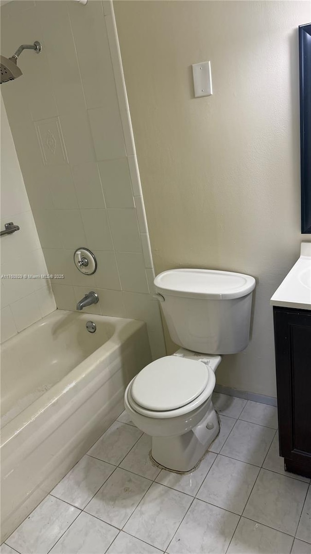 full bathroom with toilet, shower / washtub combination, vanity, and tile patterned flooring