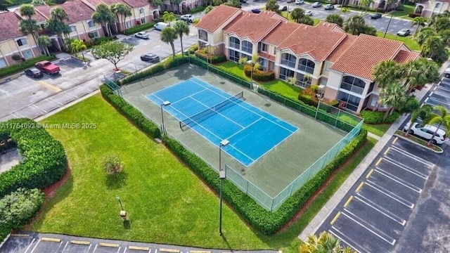 birds eye view of property with a residential view