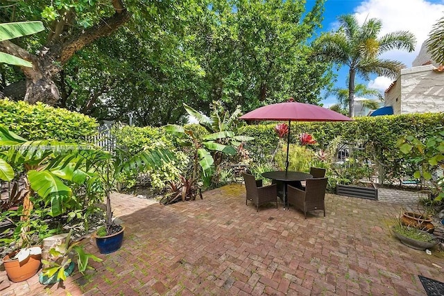 view of patio featuring outdoor dining space