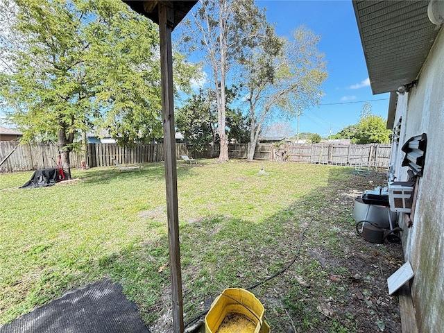 view of yard featuring a fenced backyard