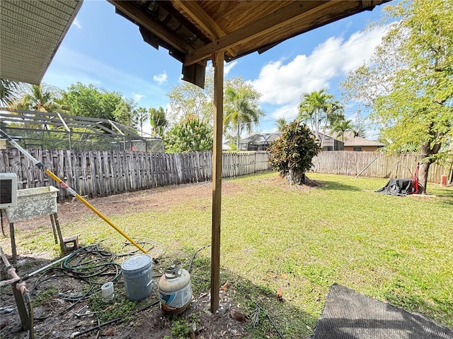 view of yard featuring a fenced backyard