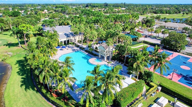 birds eye view of property with view of golf course