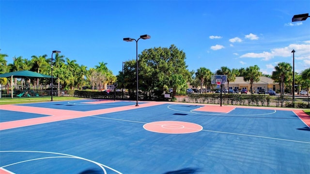 view of sport court with community basketball court and fence