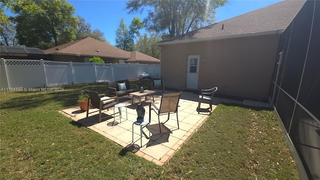 view of yard with a patio area and fence