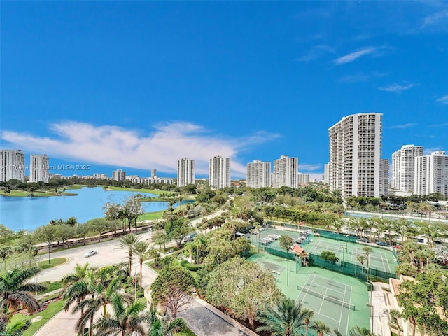 aerial view featuring a city view and a water view